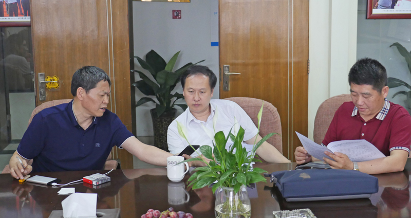 淮北建投控股集团董事长顾俊到华力考察交流